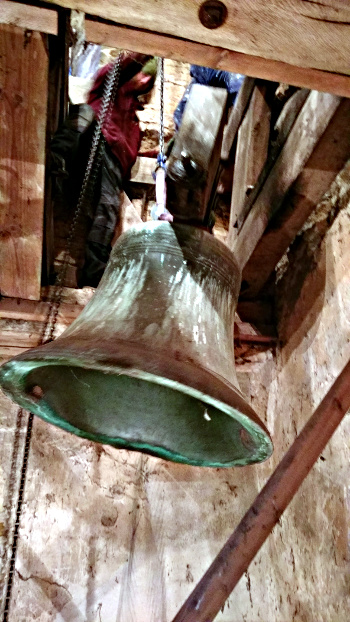First bell descending from belfry